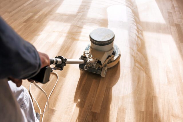 hardwood flooring being buffed